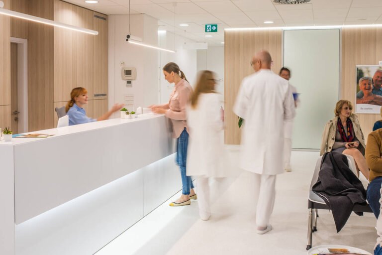 Doctor providing urgent care services at First Care Family Clinic for walk-in patients.