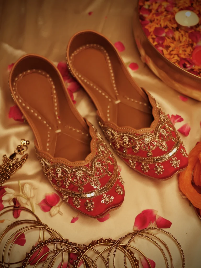 Handcrafted bridal jutti with intricate embroidery, pearl embellishments, and traditional wedding design for brides